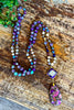 Crossing Paths Necklace - Purple .